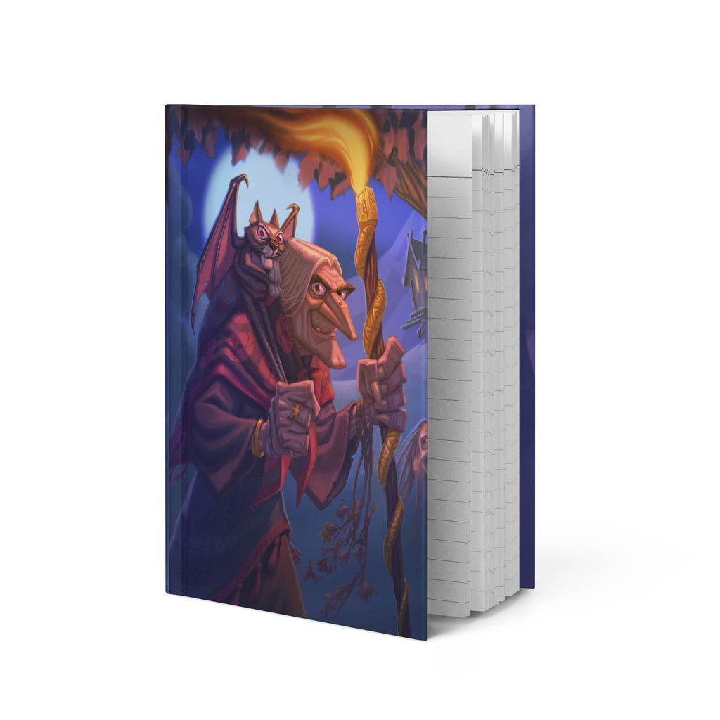 Mockup of Baba Yaga hardcover journal  by Alexander Petkov. Commissioned illustration with chicken hut, skull fence, and cat familiar.

