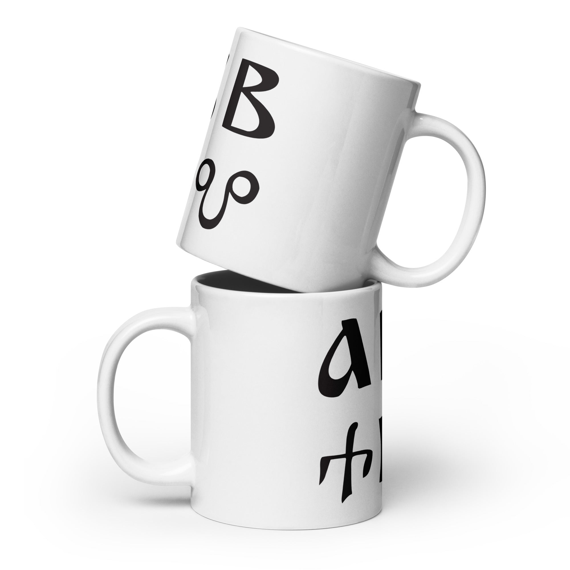 Mocukup of Bulgarian azbuka - alphabet - on two white ceramic mugs.