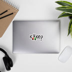 Bulgarian kuker vinyl sticker, stylized with kuker bells. Mockup on laptop with headphones and notebook.