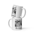 Mockup of two white mugs with an illustration of a rusalka by Ivan Bilibin, with saying "Time to call the witches."