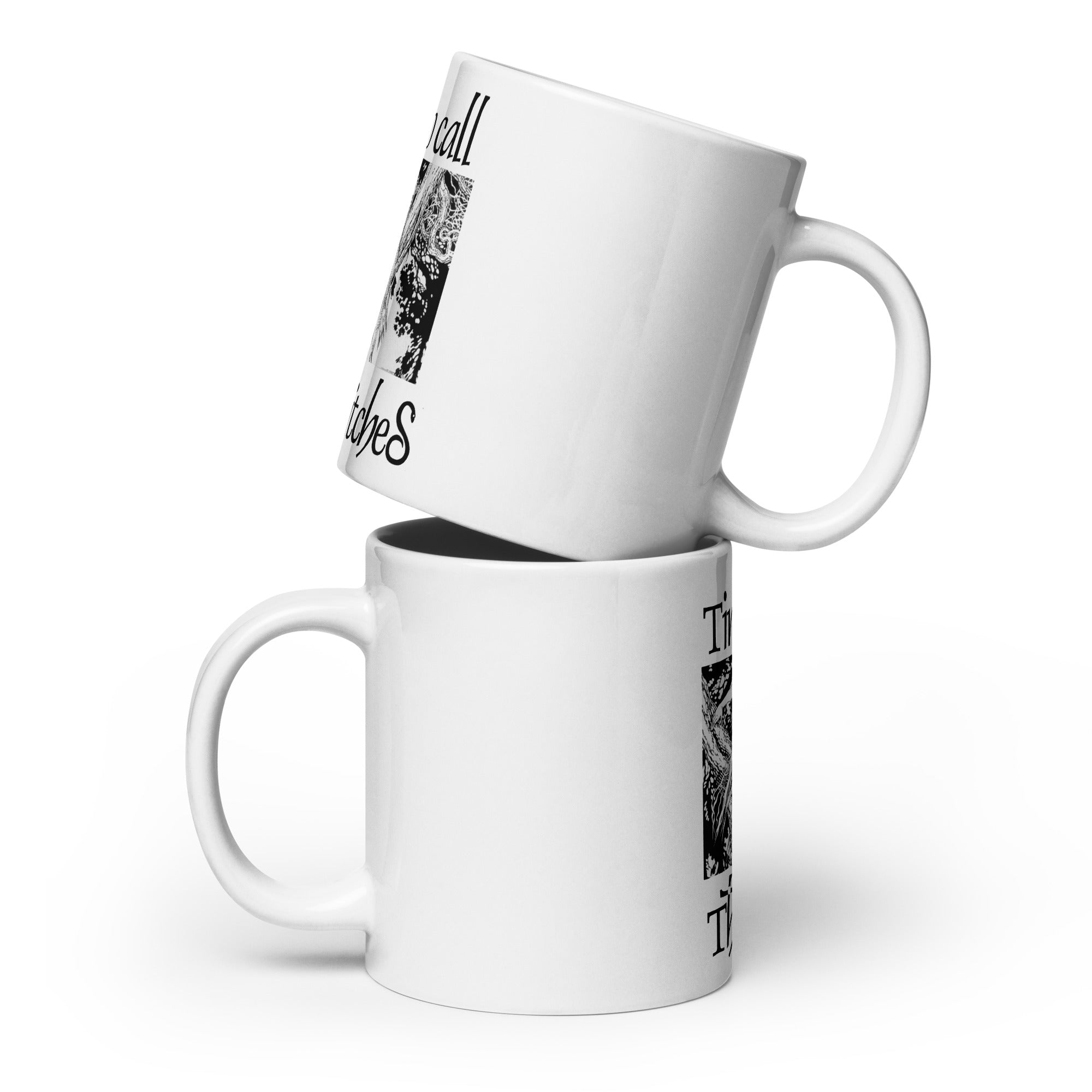 Mockup of two white mugs with an illustration of a rusalka by Ivan Bilibin, with saying "Time to call the witches."mockup